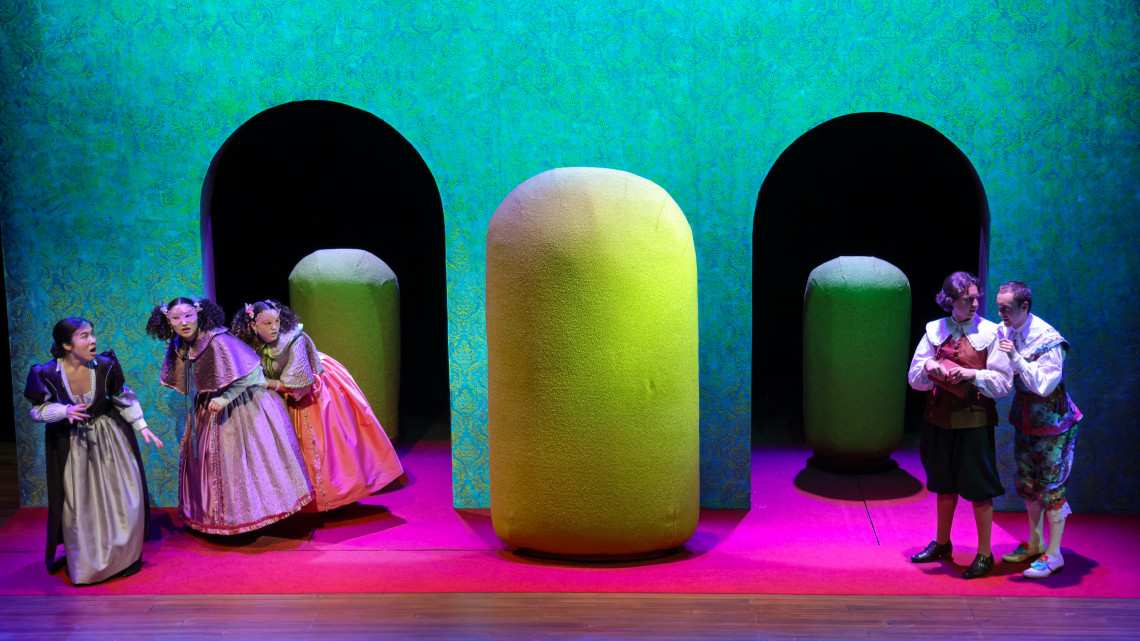 students on stage for production of "The Liar"