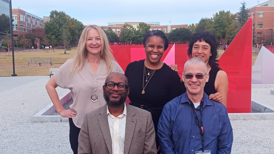 Faculty Leadership Development group smiling together