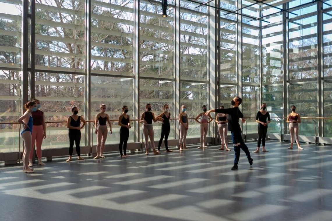 group of ballet students in line with instructor 