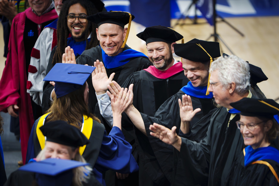 Biology faculty high five graduates