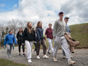 group of students walking along path during weekend retreat at Camp Cheerio. Photo courtesy John West/Trinity Communications