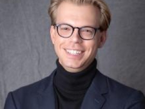 Andrew Ross with grey background