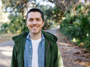 Scott Lee, standing outside with trees in the background