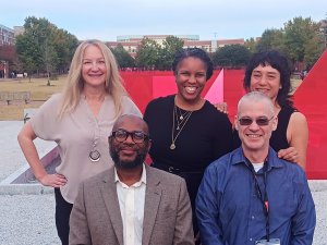 Faculty Leadership Development group smiling together