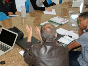 people sitting around table working