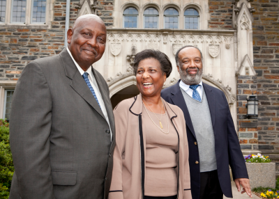 Three Black alumni pose together on Duke's campus