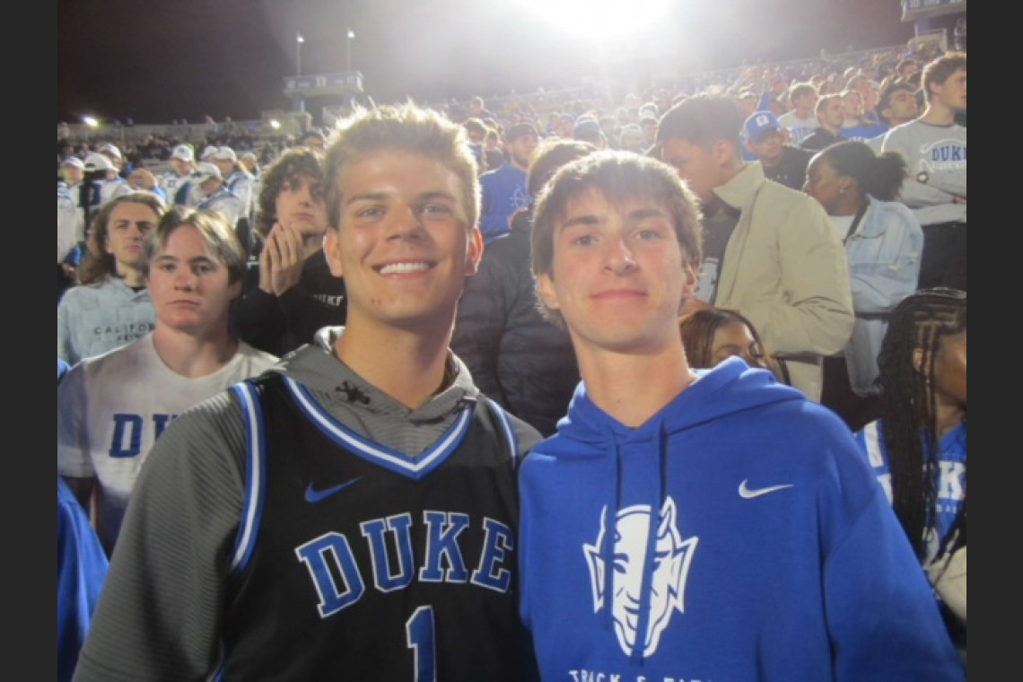 drew and friend at football game